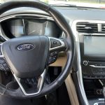 Ford Fusion Hybrid weekly rental at SPG Fleet Co photo 7