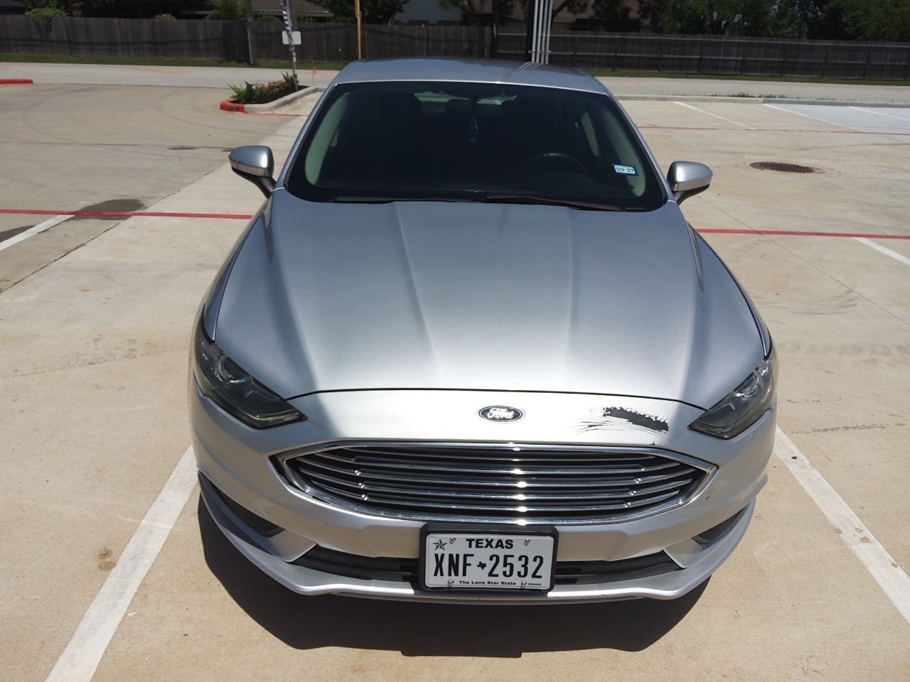 Ford Fusion Hybrid silver weekly rental at SPG Fleet Co