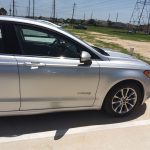 Ford Fusion Hybrid silver weekly rental at SPG Fleet Co photo 2