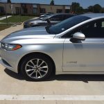 Ford Fusion Hybrid silver weekly rental at SPG Fleet Co photo 4