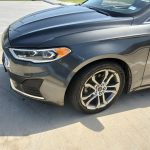 Ford Fusion weekly rental at SPG Fleet Co photo 5